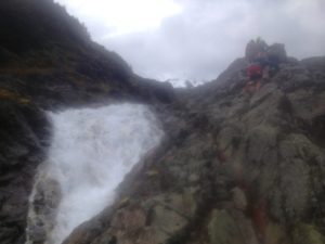 A watery scramble to the top - photo courtesty of a fellow runner